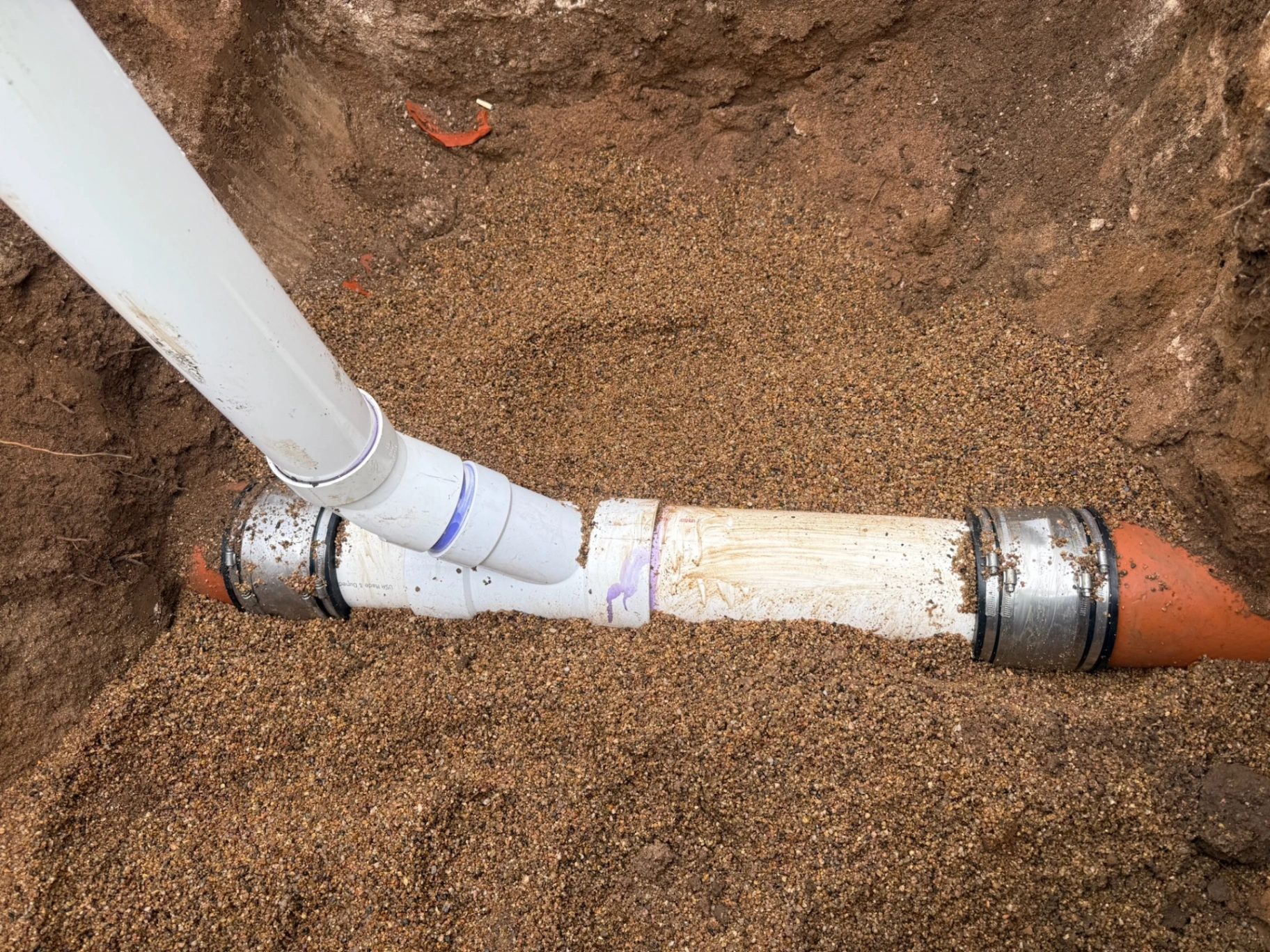 Sewer line repair with new PVC fittings